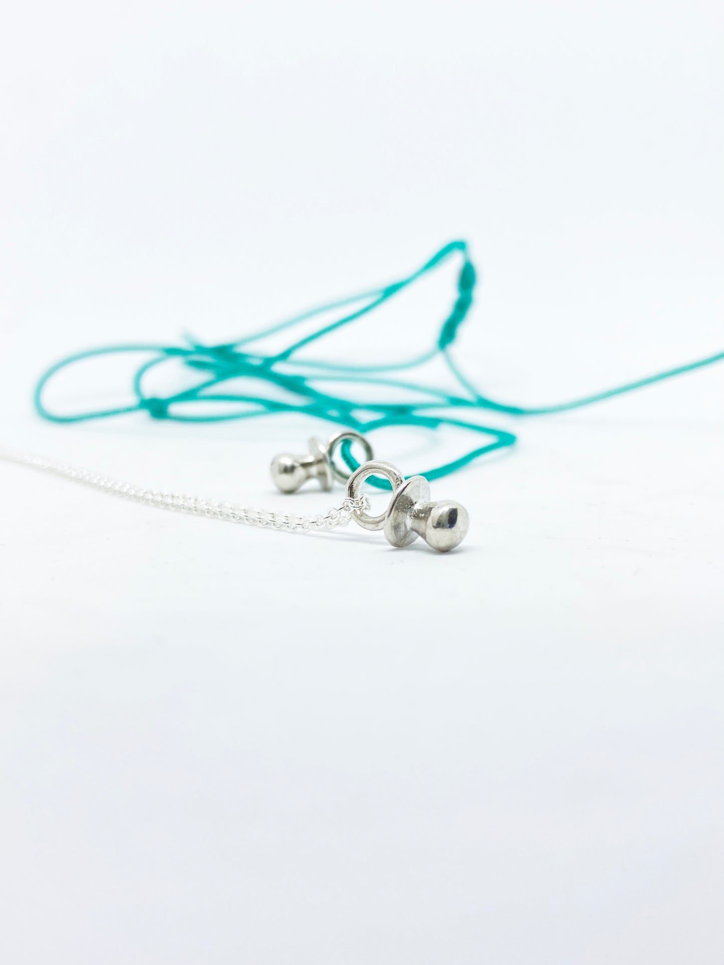 Penjoll XUMET de plata 